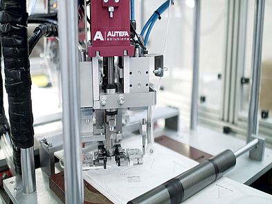 Detail of mask machine line with printer