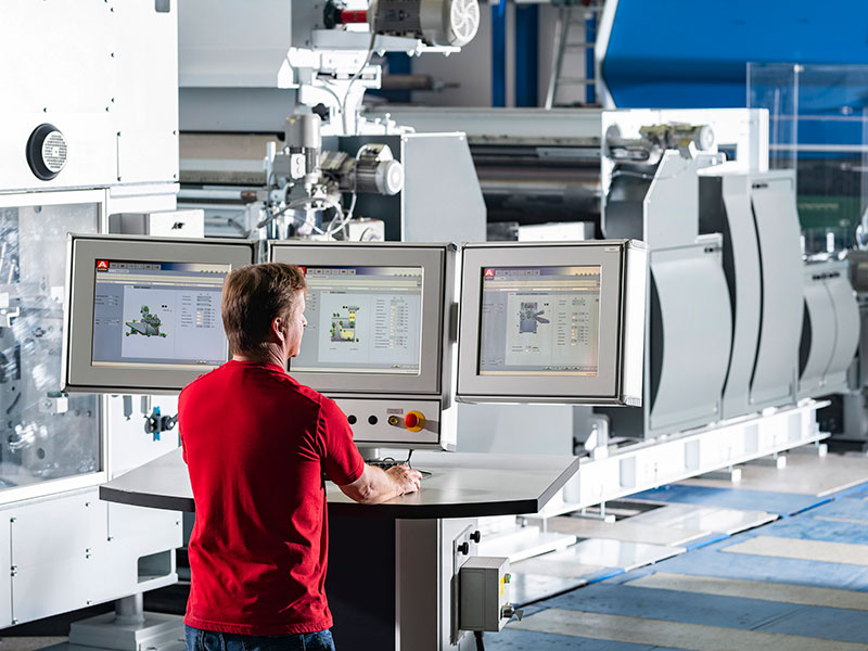 Worker operates machine system through the control unit