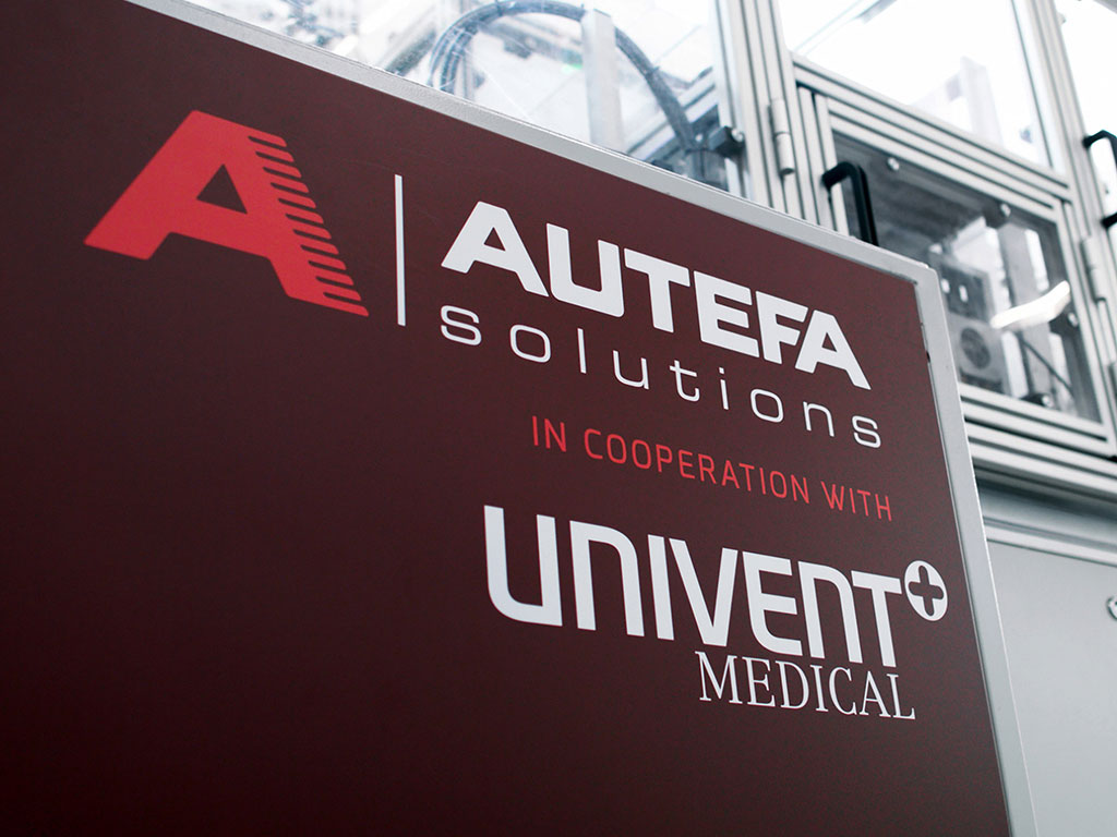 Detail of machine labeling with AUTEFA Solution and univent medical logos